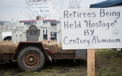  A makeshift cemetery sits prominently at the retirees protest camp, each cross representing a fellow retiree that has passed away since Century Aluminum cancelled their healthcare insurance in 2010, after the company suspended operations at the facility.