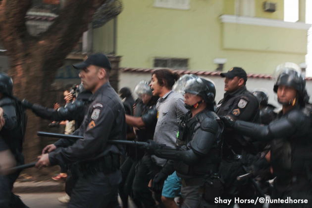 A protester being arrested after a clash between the protesters and the Military Police. 